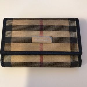 Authentic used Burberry key holder.